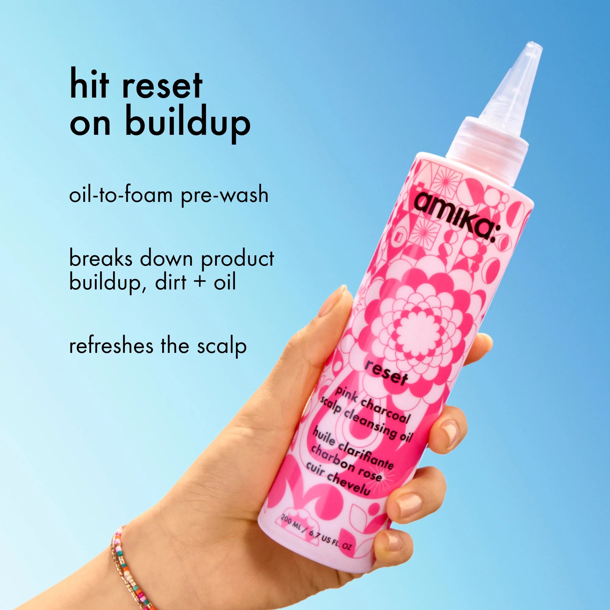 pink charcoal scalp cleansing oil